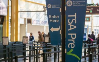 TSA lines at an airport during the day, not very busy