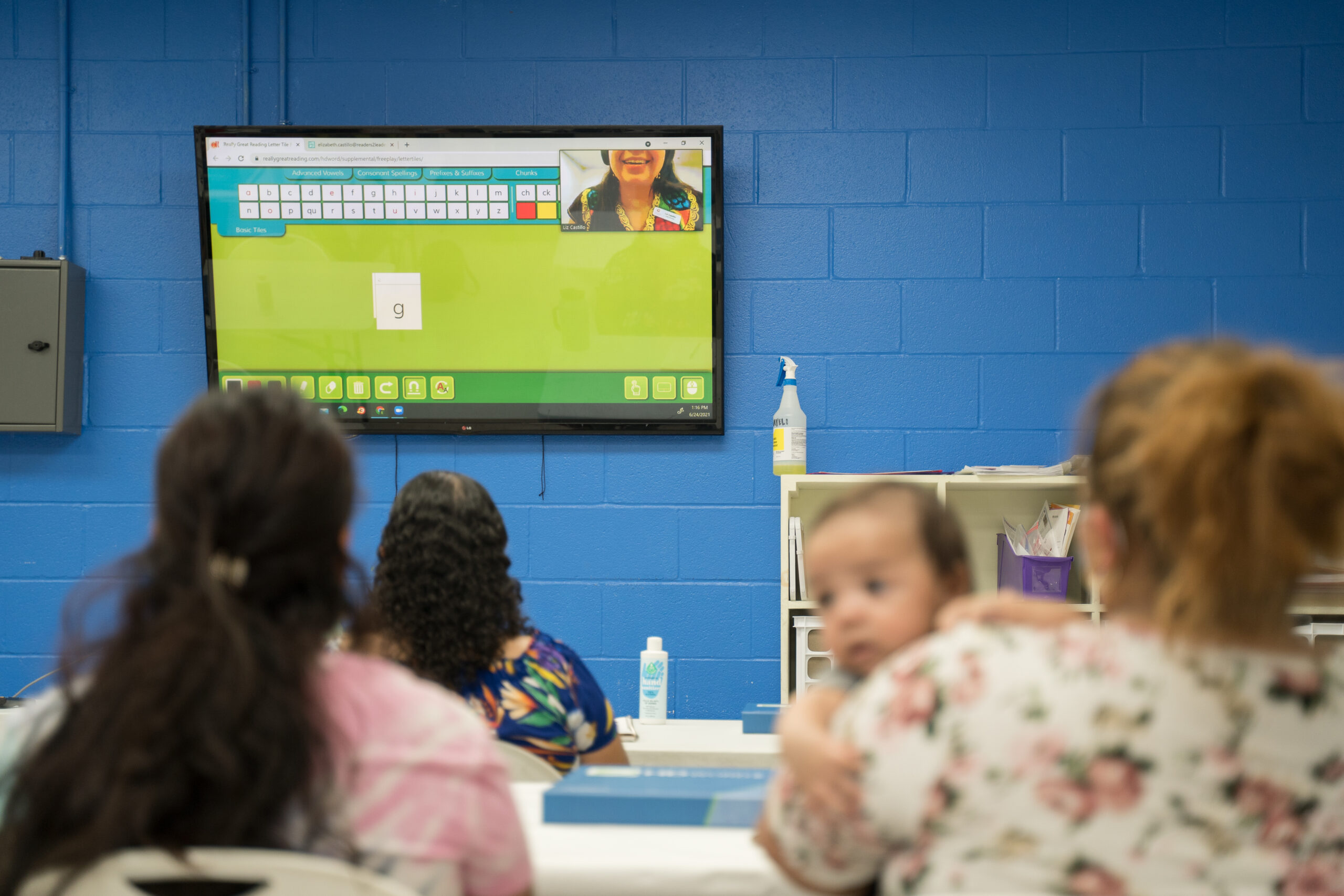 women watching an online class