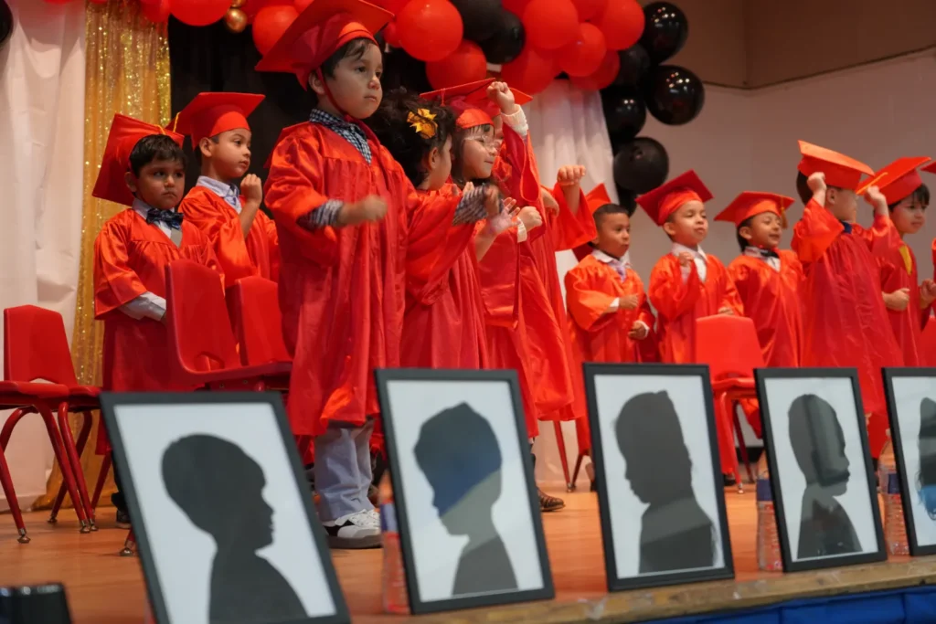 children standing during twl graduation